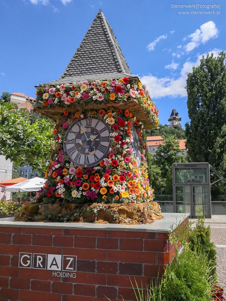 Blumenuhrturm Holding Graz